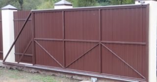 Купить откатные ворота из профнастила Лиски, цена от 1750 руб.