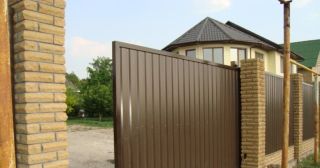 Купить откатные ворота из профнастила Лиски, цена от 1750 руб.